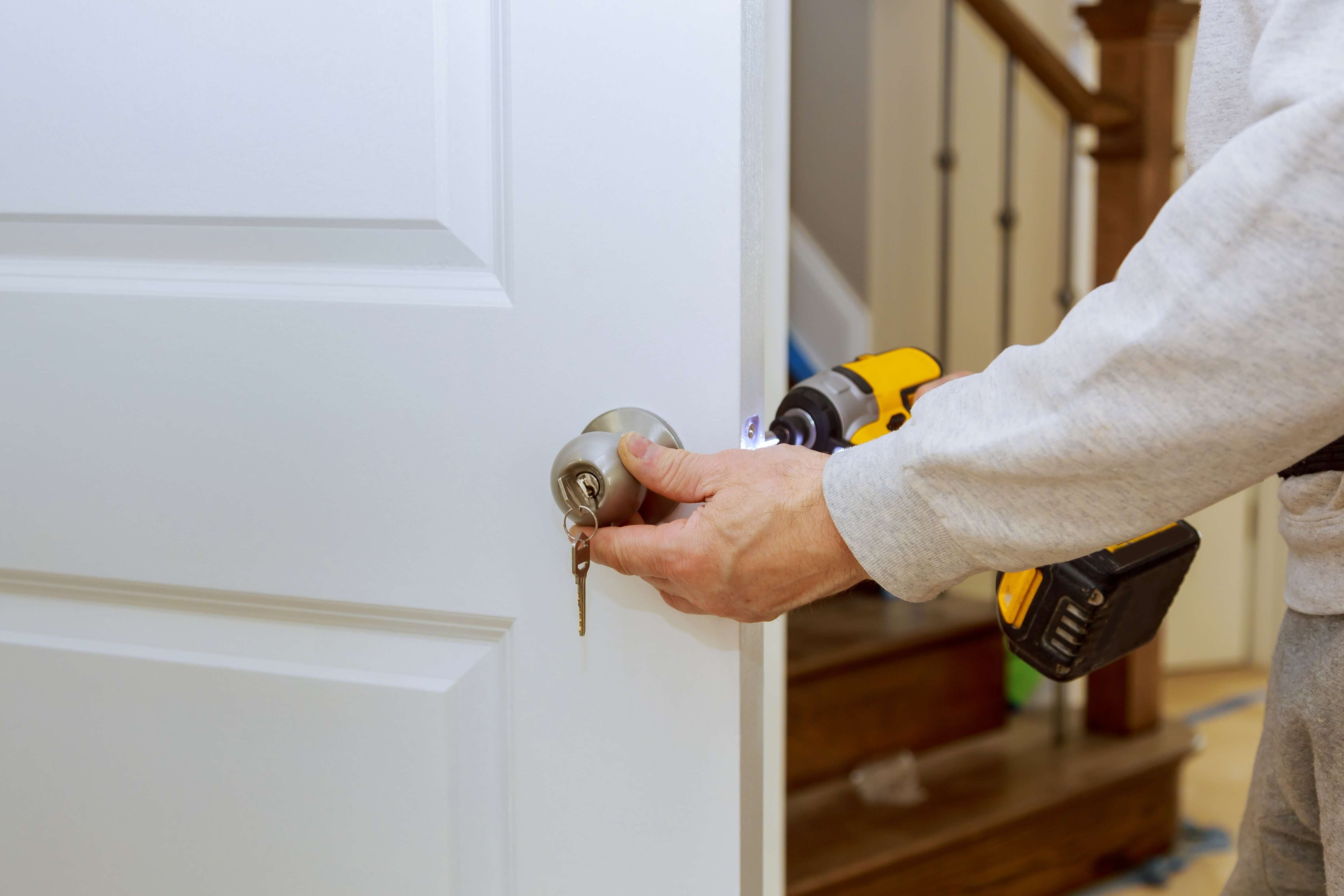 Mobile locksmith working with professional tools — sharper pricing than the dealer