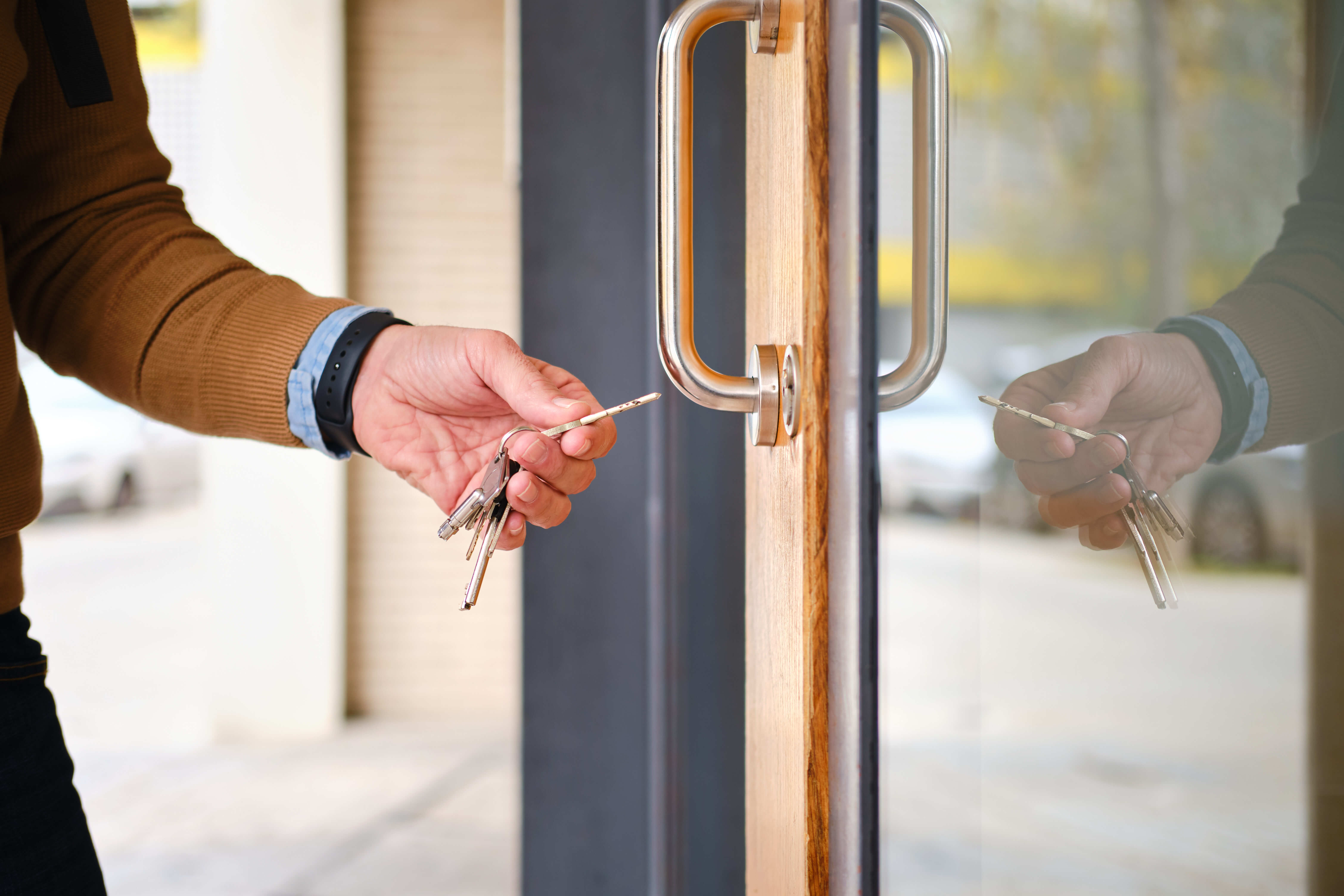 Handing over keys after a commercial locksmith job in Wodonga